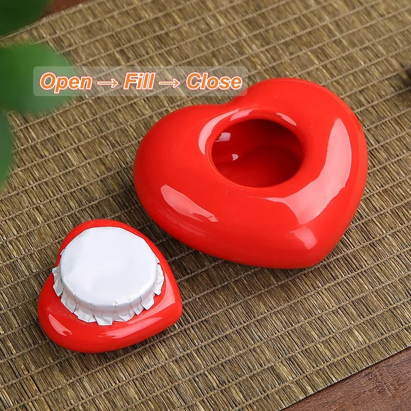 Open heart-shaped ceramic pet urn showing the interior for pet ashes