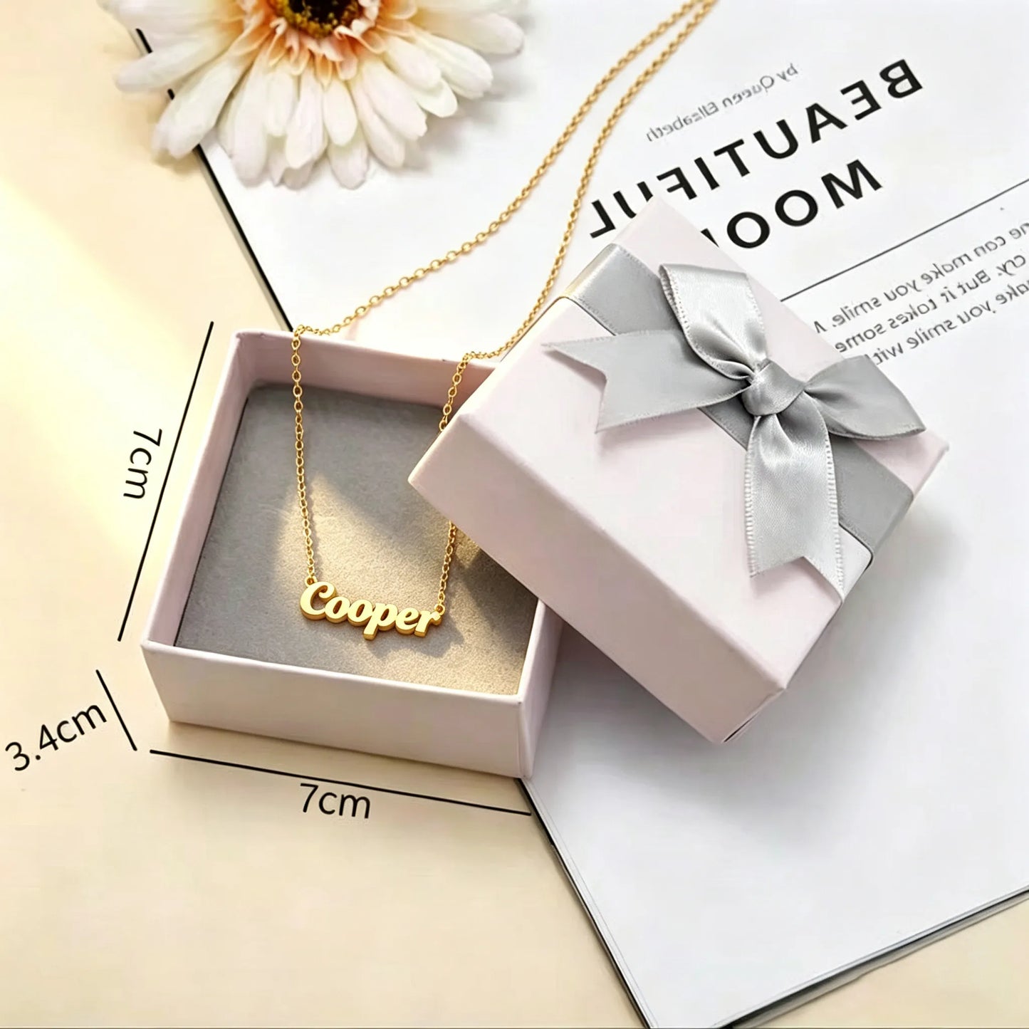 Premium gift box featuring a personalized pet name necklace, thoughtfully packaged to celebrate every chapter of a pet's journey—from welcoming a new companion to honoring a lifetime of love.