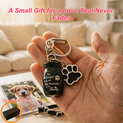 Pet memorial keepsake keychain held in hand beside a pet photo as a remembrance gift