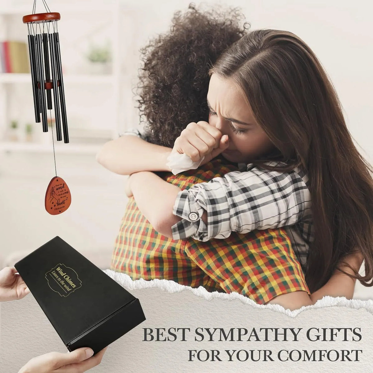 A thoughtful sympathy gift box containing a memorial wind chime for someone grieving a beloved pet.