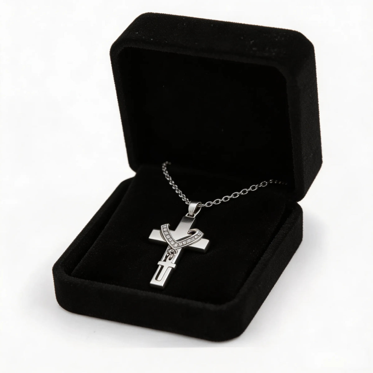 Pet memorial cross necklace displayed with an elegant gift box