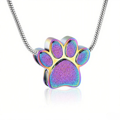 Pet memorial paw urn necklace with rainbow finish for holding ashes or keepsakes.