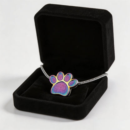 Pet memorial paw print necklace displayed with an elegant gift box