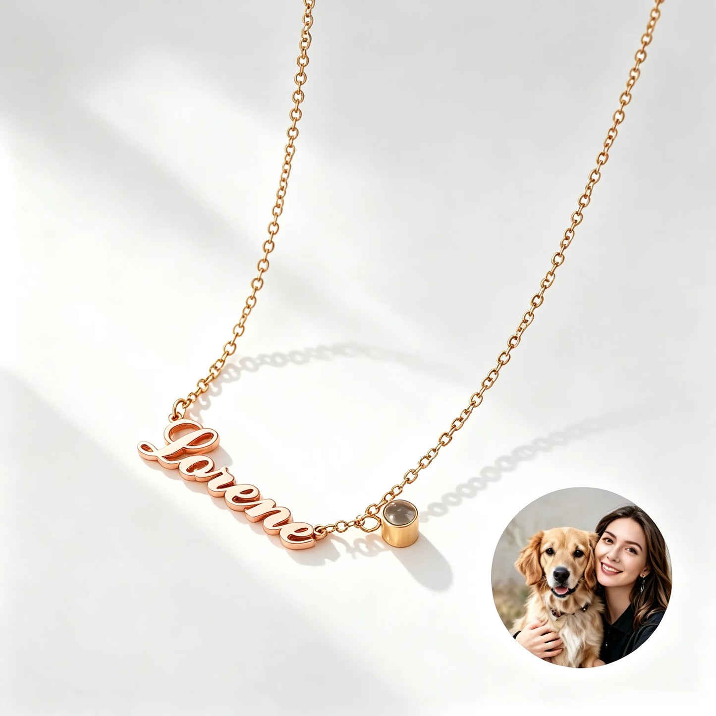 Rose gold personalized pet name projection necklace with paw charm and hidden photo projection, crafted from durable stainless steel.
