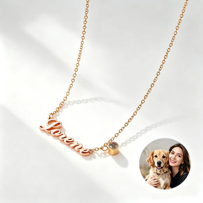 Rose gold personalized pet name projection necklace with paw charm and hidden photo projection, crafted from durable stainless steel.
