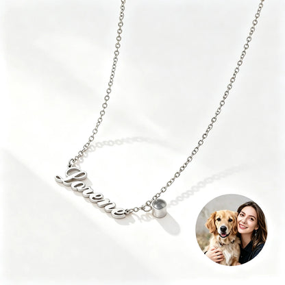 Silver personalized pet keepsake necklace with custom name and hidden photo projection, perfect for everyday wear or meaningful gifts.